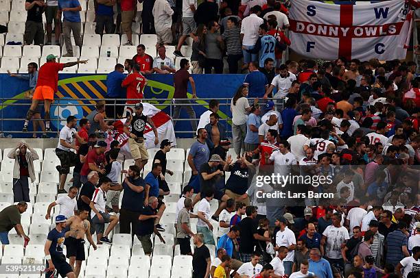 Fans clash after the UEFA EURO 2016 Group B match between England and Russia at Stade Velodrome on June 11, 2016 in Marseille, France.