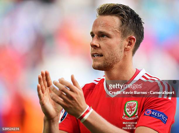 Wales's Chris Gunter applauds the Welsh fans following their 2-1 victory over Slovakia during the UEFA Euro 2016 Group B match between Wales and...
