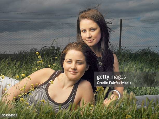 Jockey sisters Michelle and Cathy Payne at their brother's property in Rockbank 22nd September 2004. THE MELBOURNE MAGAZINE Picture by SIMON SCHLUTER