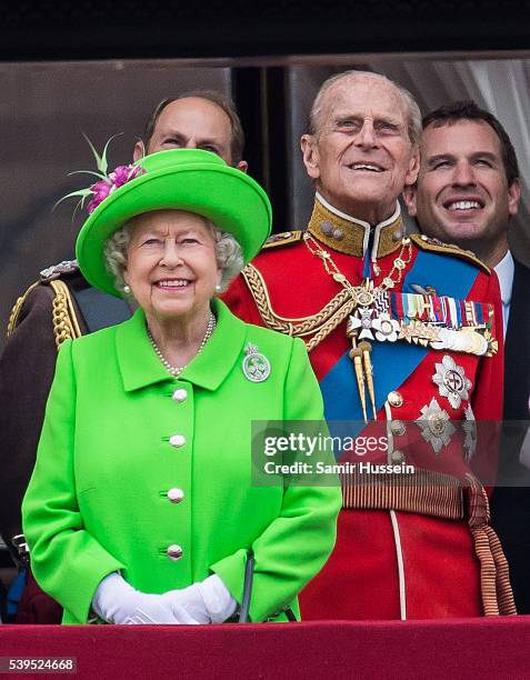 Queen Elizabeth II and Prince Philip, Duke of Edinburgh stand on the balcony during the Trooping the Colour, this year marking the Queen's official...