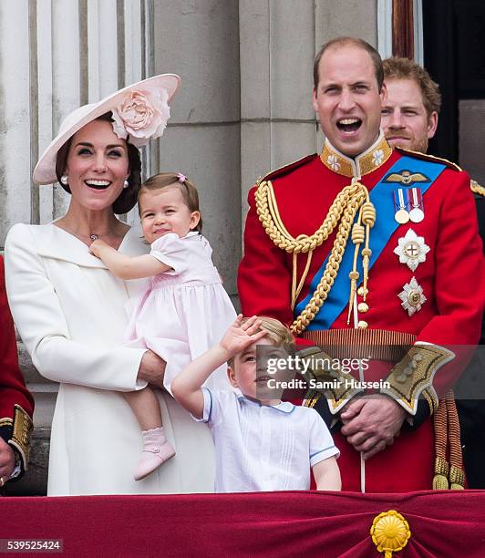 Catherine, Duchess of Cambridge, Princess Charlotte, Prince George, Prince William, Duke of Cambridge stand on the balcony during the Trooping the...