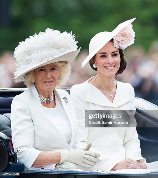 Camilla, Duchess of Cornwall and Catherine, Duchess of Cambridge ride by carriage during the Trooping the Colour, this year marking the Queen's...