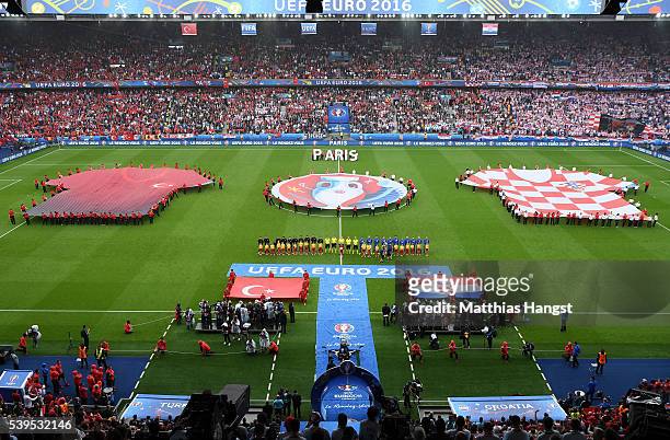 Players line up for the national anthems prior to the UEFA EURO 2016 Group D match between Turkey and Croatia at Parc des Princes on June 12, 2016 in...