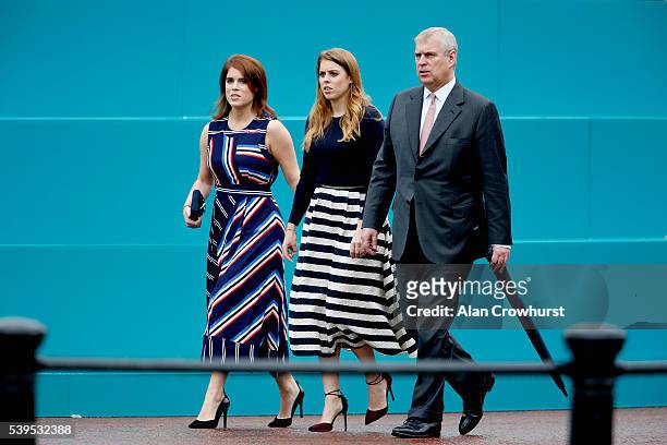 Princess Eugenie of York, Princess Beatrice of York and Prince Andrew, Duke of York walk about during "The Patron's Lunch" celebrations for The...