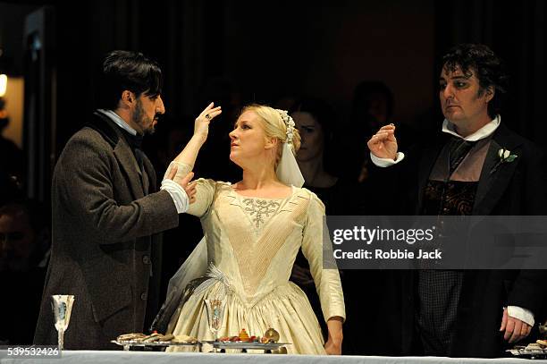 Charles Castronovo as Edgardo, Diana Damrau as Lucia and Ludovic Tezier as Enrico Ashton in the Royal Opera's production of Gaetano Donizetti's...