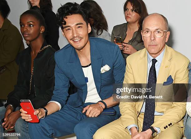 Leomie Anderson, Hu Bing and Dylan Jones attend the Christopher Raeburn show during The London Collections Men SS17 at BFC Show Space on June 12,...