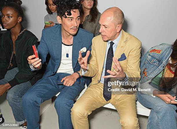 Leomie Anderson, Hu Bing and Dylan Jones attend the Christopher Raeburn show during The London Collections Men SS17 at BFC Show Space on June 12,...