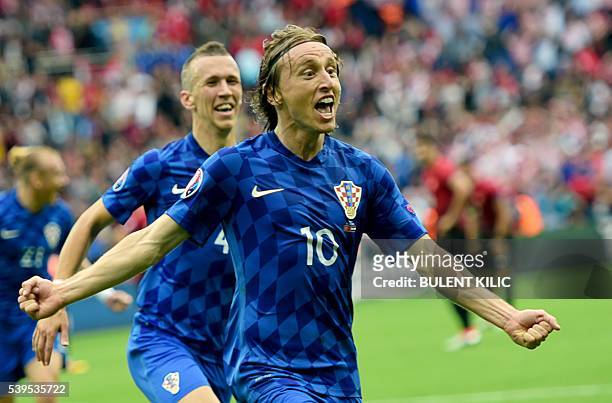 Croatia's midfielder Luka Modric celebrates a goal during the Euro 2016 group D football match between Turkey and Croatia at Parc des Princes in...