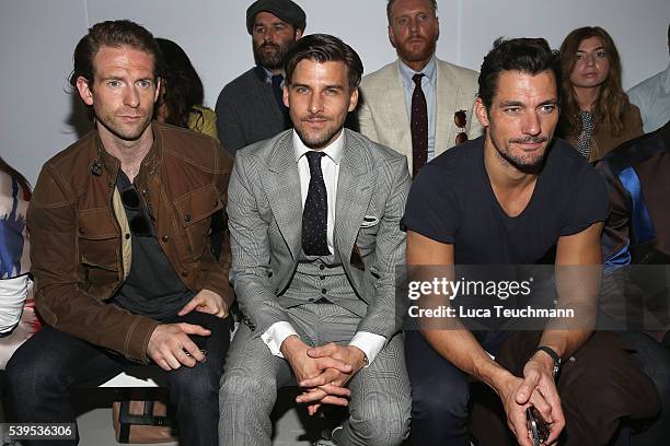 Craig McGinlay, Johannes Huebl and David Gandy attend the Christopher Raeburn show during The London Collections Men SS17 at on June 12, 2016 in...