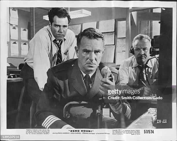 Film still of American actor Sterling Hayden in the film Zero Hero, Hayden appears in the center of the still, actor Charles Quinlivan appears on the...