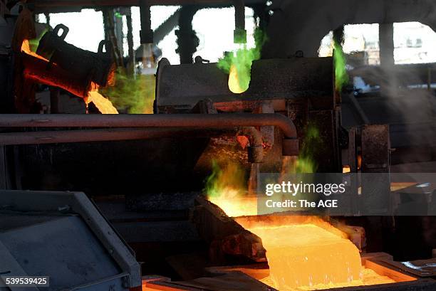 Pouring copper anodes at the Olympic Dam Mine in South Australia. The Mine, belonging to Western Mining Corp., produces uranium, silver, gold and...