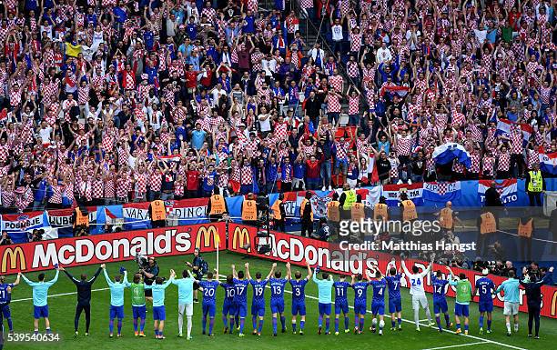 Croatia players celebrate their 1-0 win with supporters after the UEFA EURO 2016 Group D match between Turkey and Croatia at Parc des Princes on June...