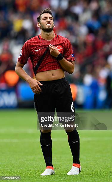 Hakan Calhanoglu of Turkey shows his frustration during the UEFA EURO 2016 Group D match between Turkey and Croatia at Parc des Princes on June 12,...