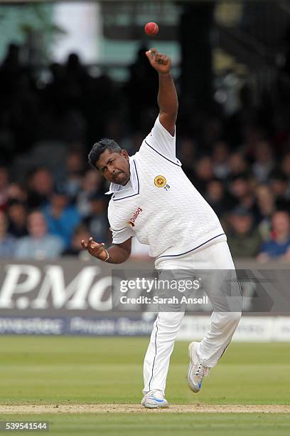 Sri Lanka's Rangana Herath bowls during day four of the 3rd Investec Test match between England and Sri Lanka at Lord's Cricket Ground on June 12,...