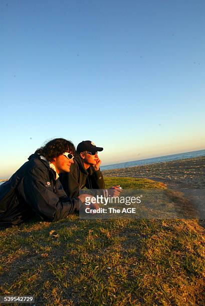 Backpackers Andrew Desrochers from Hinton, Alberta in Canada and Steve Martin from Bamberg, Ontario in Canada taking in the sun this afternoon at St...