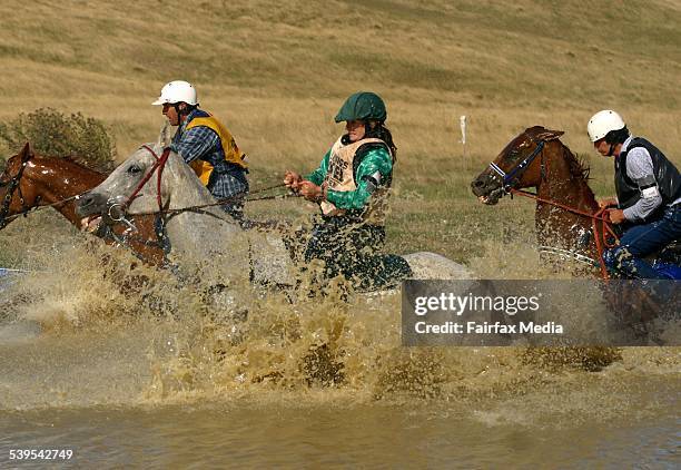 Lancefield Mountain Races. Tanya Kennedy on Pumbah takes a dip during the challenging 3.7km Open Race. 5th March 2005 AGE NEWS Picture by NICOLE...