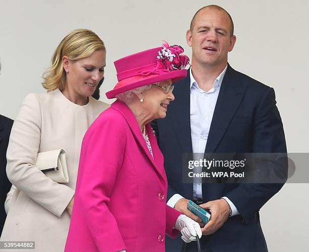 Zara Phillip, Mike Tindall and Queen Elizabeth II leave after attending "The Patron's Lunch" celebrations for The Queen's 90th birthday on The Mall...