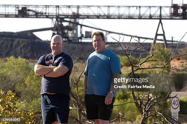 Employees, Mark Edmonds and Colin Wright out the front of Olympic Dam mine near Roxby Downs. Wednesday 9th March 2005. AGE NEWS Picture by DAVID...