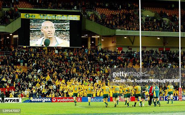 Tri-Nations Rugby Union match at Suncorp Stadium, Brisbane. Australia v South Africa. Wallabies salute the crowd while captain George Gregan talks on...