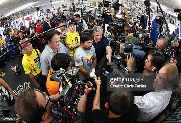 April 15 Los Angeles,Calif. --- Boxing superstar Manny Pacquiao works out during media day to a standing-room only crowd of three hundred, Wednesday...