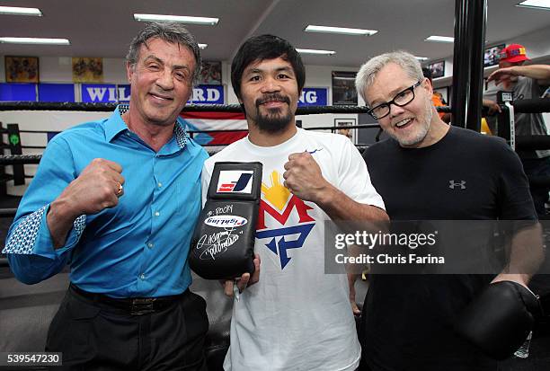 April 18 Hollywood,Calif. --- Actor Sylvester Stallone visits boxer Manny Pacquiao and trainer Freddie Roach, Saturday at the Wild Card Boxing Club...