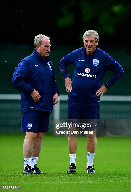 Roy Hodgson manager of England speaks with Ray Lewington assistant Manager of England during a training session at Stade du Bourgognes on June 12,...