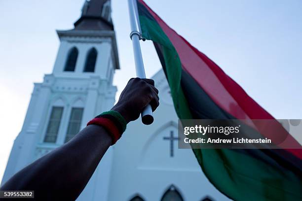 Almost a week after a lone racist gunmen murdered nine parishioners at the historical African-American Emanuel AME Church in Charleston, South...