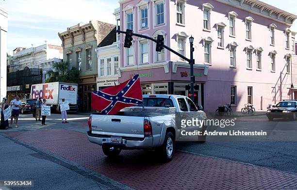 Almost a week after a lone racist gunmen murdered nine parishioners at the historical African-American Emanuel AME Church in Charleston, South...