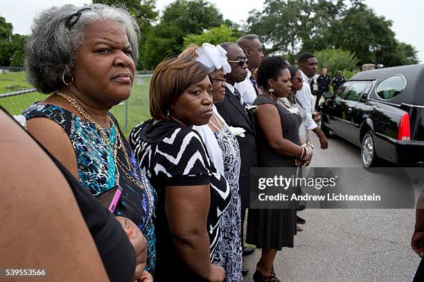 Close friends and family attend the burial service for Ethel Lance, one of the nine parishioners killed by a racist gunman at the historical Emanuel...