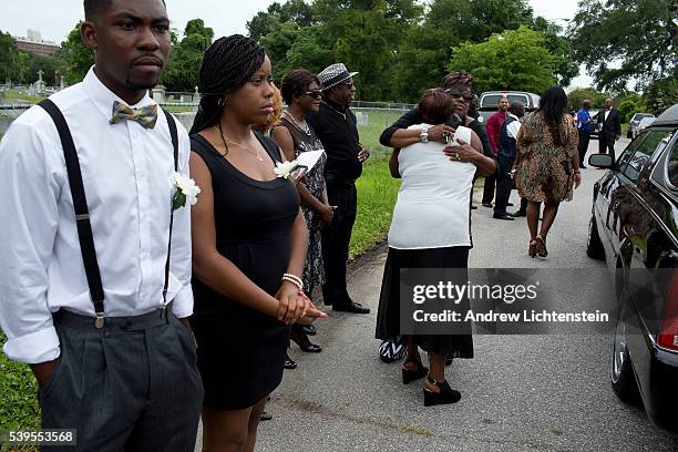 Close friends and family attend the burial service for Ethel Lance, one of the nine parishioners killed by a racist gunman at the historical Emanuel...