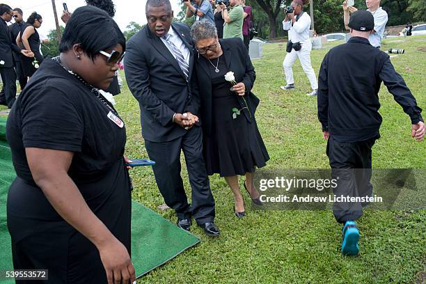 Close friends and family attend the burial service for Ethel Lance, one of the nine parishioners killed by a racist gunman at the historical Emanuel...