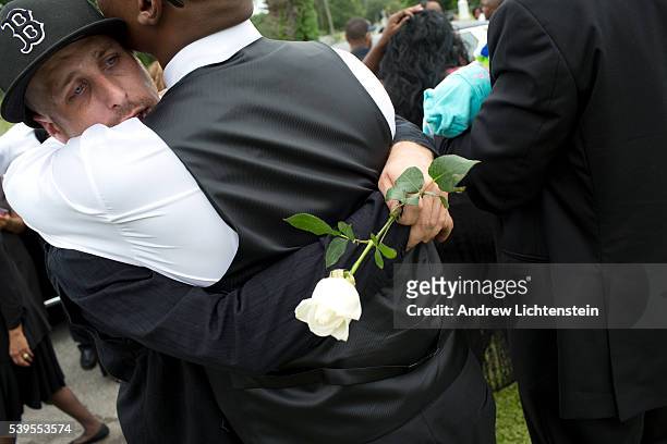 Close friends and family attend the burial service for Ethel Lance, one of the nine parishioners killed by a racist gunman at the historical Emanuel...