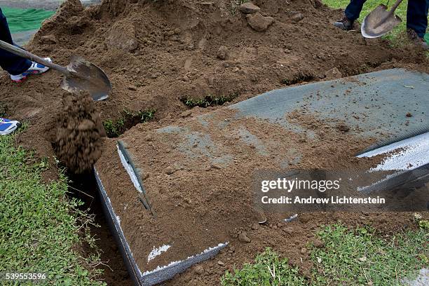 Close friends and family attend the burial service for Ethel Lance, one of the nine parishioners killed by a racist gunman at the historical Emanuel...