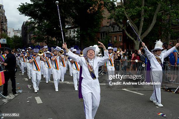 Huge crowds gather on Christopher Street in the West Village, outside of the historic Stonewall Inn, to watch and march in the annual New York Gay...