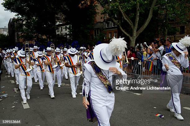 Huge crowds gather on Christopher Street in the West Village, outside of the historic Stonewall Inn, to watch and march in the annual New York Gay...