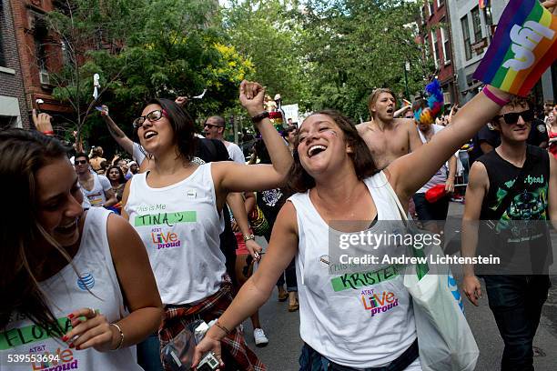 Huge crowds gather on Christopher Street in the West Village, outside of the historic Stonewall Inn, to watch and march in the annual New York Gay...