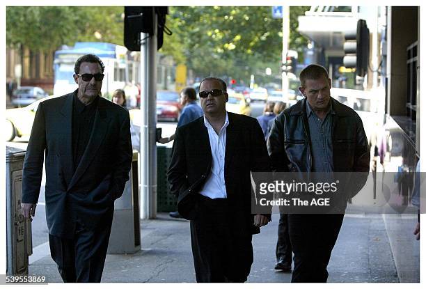 Mario Condello, far left, arrives at the Melbourne Magistrates court to hear a remand hearing for Mick Gatto who has been charged with the murder of...
