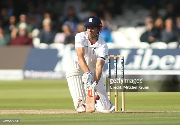 Alastair Cook of England plays a ramp shot during day four of the 3rd Investec Test match between England and Sri Lanka at Lords Cricket Ground on...