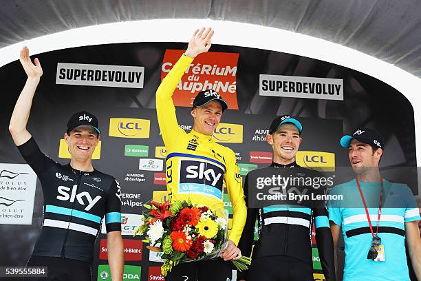 Team SKY riders Salvatore Puccio, Chris Froome and Luke Rowe and Directeur Sportif Nicolas Portal stand on the podium after stage seven of the 2016...