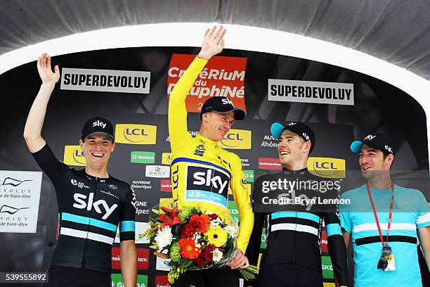 Team SKY riders Salvatore Puccio, Chris Froome and Luke Rowe and Directeur Sportif Nicolas Portal stand on the podium after stage seven of the 2016...