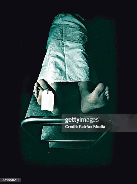 Dead man lying on a trolley in the morgue with toe tag on 28 February 2002 AFR NEWS Picture by LOUIE DOUVIS