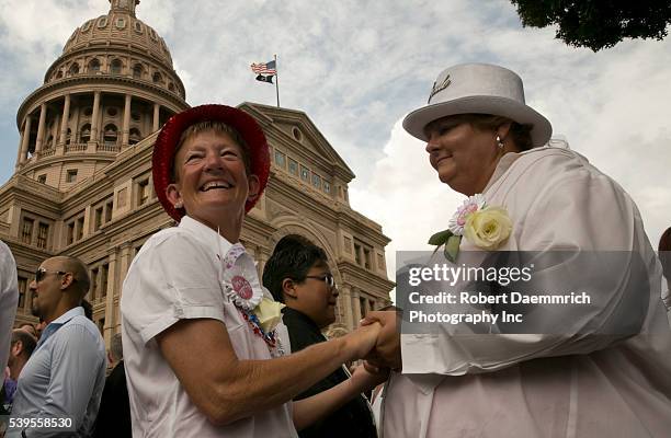 July 4th, 2015 Austin, Texas USA: A week following the US Supreme Court decision legalizing same-sex marriage in the US, dozens of couples were...