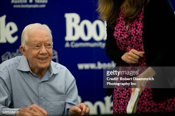 Former President and Nobel Peace Prize winner, Jimmy Carter, signs copies of his new book A Full Life: Reflections at Ninety at Book People in...