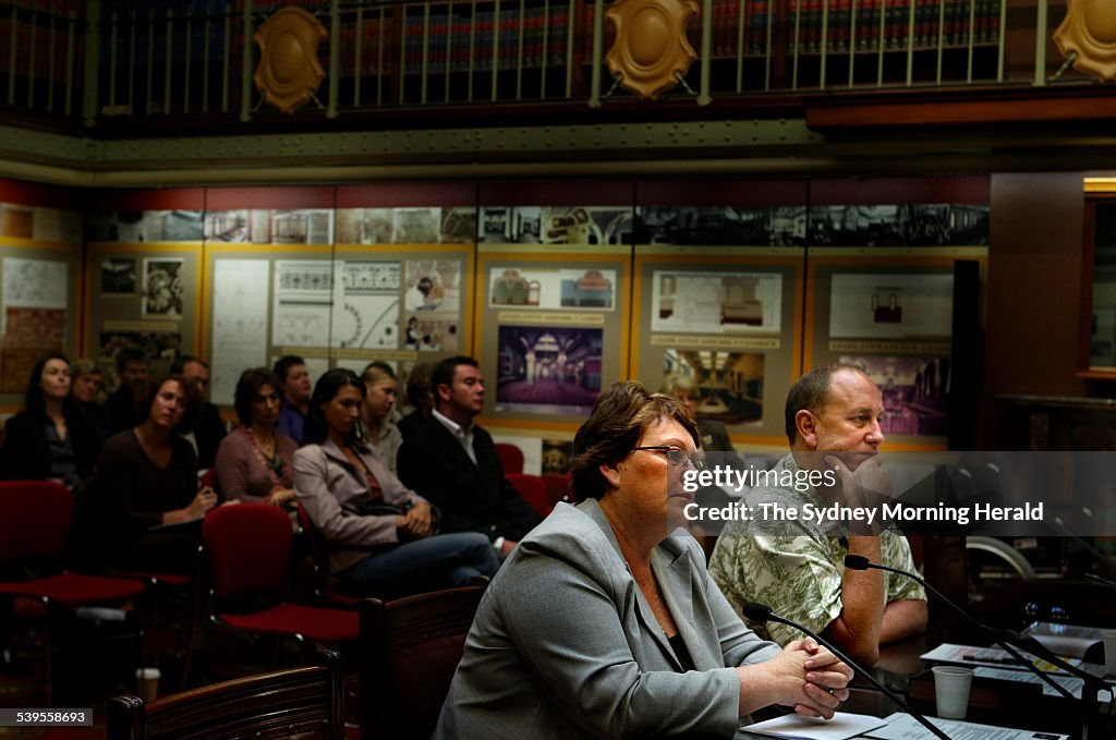 Parent Ms Lynne Gould (grey suit, second from right) whose son Nathan Gould has