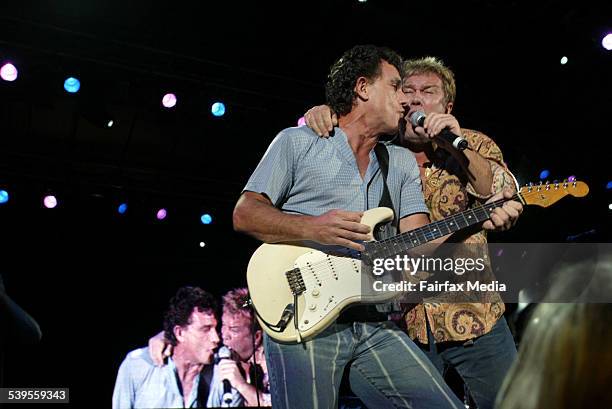 Ian Moss and Jimmy Barnes of Cold Chisel performing at the Melbourne International Music Festival Tsunami benefit at the Myer Music Bowl 27th...