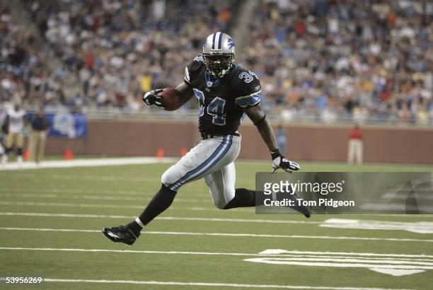 Kevin Jones of the Detroit Lions runs to the end zone against the St. Louis Rams during a pre-season NFL game at Ford Field on August 29, 2005 in...