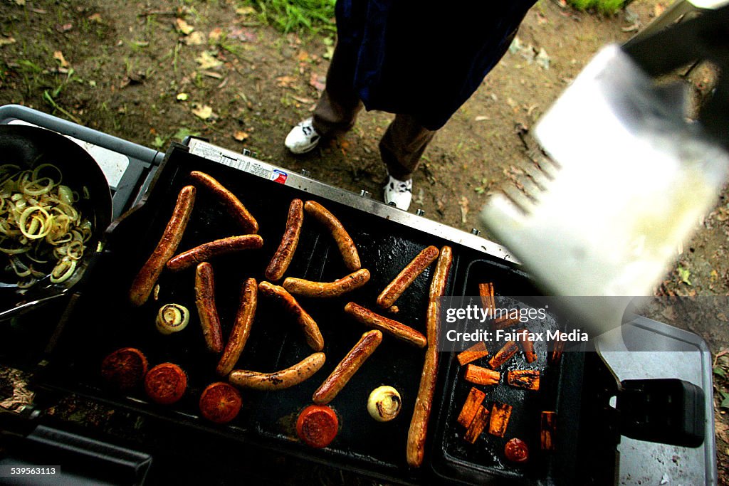 A Reserve Bank of Australia barbeque with the letters RBA spelt out in sausages