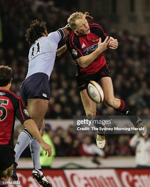 Rugby Union Super Twelve Final at Christchurch. Canterbury Crusaders v NSW Waratahs. Lote Tuqiri challenges Scott Hamilton for a high ball, 28 May...