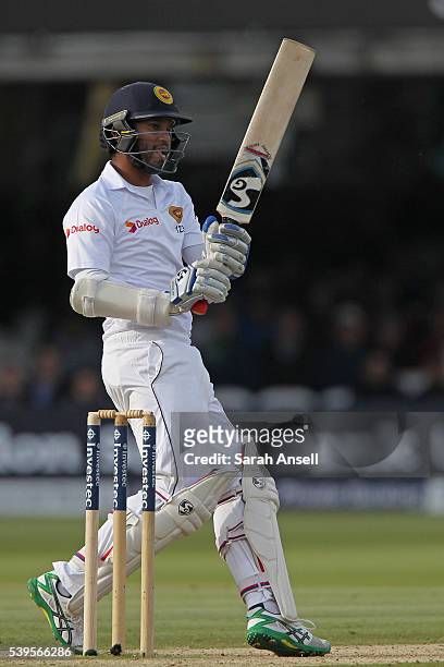 Sri Lanka's Dimuth Karunaratne pulls for four runs during day four of the 3rd Investec Test match between England and Sri Lanka at Lord's Cricket...