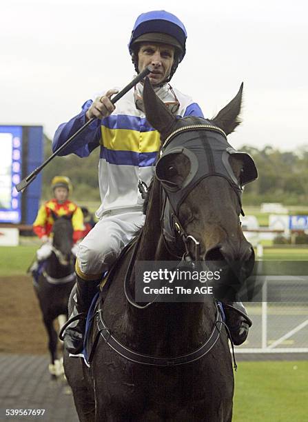 Sandown Horseracing - 4th June, 2005 - Race 7 - Peter Mertens returns to scale after winning on Universal Heights on 4th June, 2005. THE AGE SPORT...